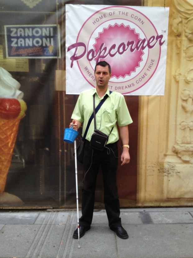 A great singer in one of the city squares